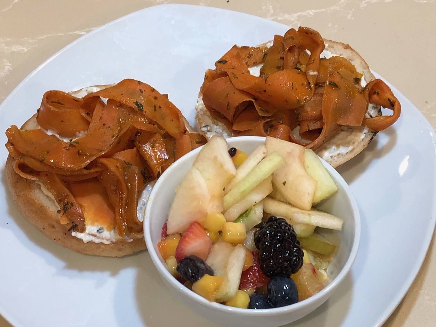 The bagels and lox at UpRising in Lake in the Hills came with a side of fresh fruit and vegan garlic herb cream cheese beneath the sweet pickled carrots, and made for a filling, healthy entree.
