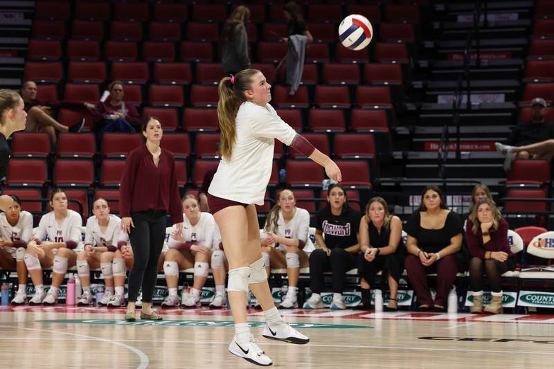 Prairie Ridge's Adelina Grider volleys a serve during the Wolves' loss in two sets, 25-20, 25-18, in the IHSA Class 3A State semifinals on Friday, Nov. 14, 2025.