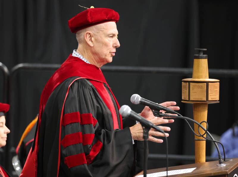 Dennis Barsema, representing the Northern Illinois University Board of Trustees, addresses the candidates for graduation during the first of two undergraduate commencement ceremonies Saturday, May 11, 2024, in the Convocation Center at NIU in DeKalb.