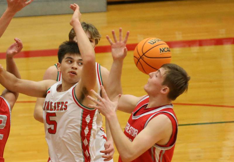 L-P's Erick Sotelo and Streator's Nolan Lukach fail to pull in a rebound on Tuesday, Jan. 14, 2025 in Sellett Gymnasium at L-P High School.