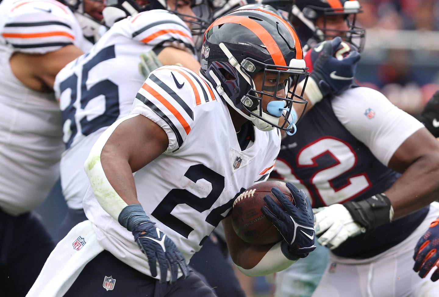 Chicago Bears running back Khalil Herbert carries the ball through the Houston Texans defensive line during their game Sunday, Sept. 25, 2022, at Soldier Field in Chicago.