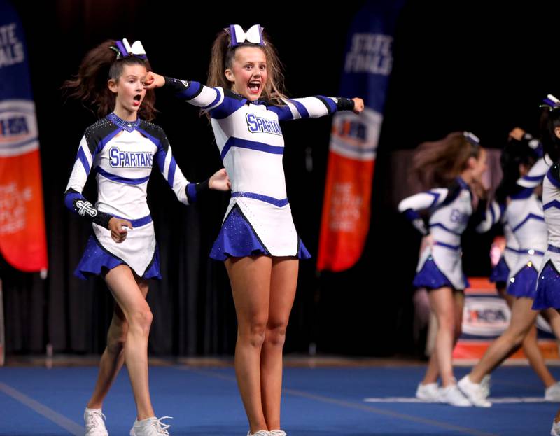 Members of the St. Francis cheerleading team compete in the small team division of the IHSA State Finals on Saturday, Feb. 8, 2025 at Grossinger Motors Arena in Bloomington.