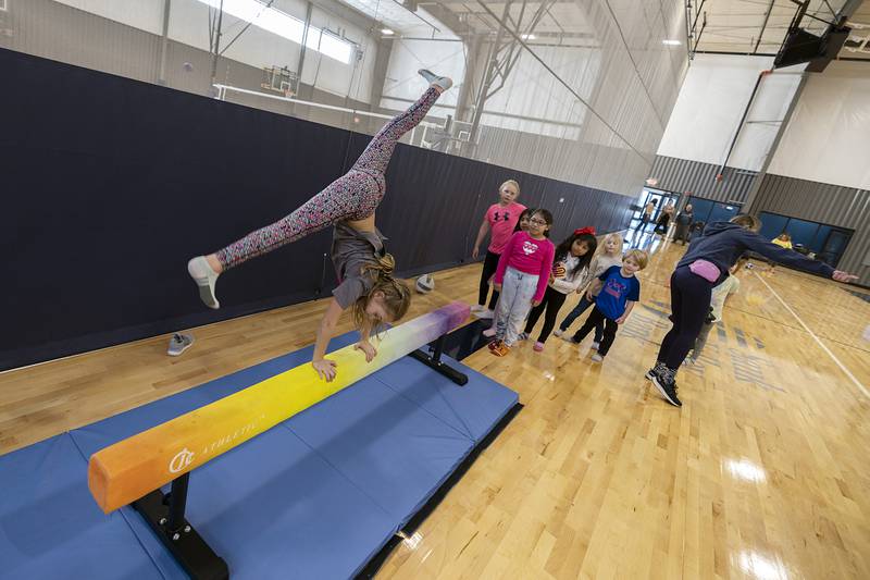 A St. Anne’s School student shows off their balance Tuesday, Jan. 31, 2023 at The Facility in Dixon.