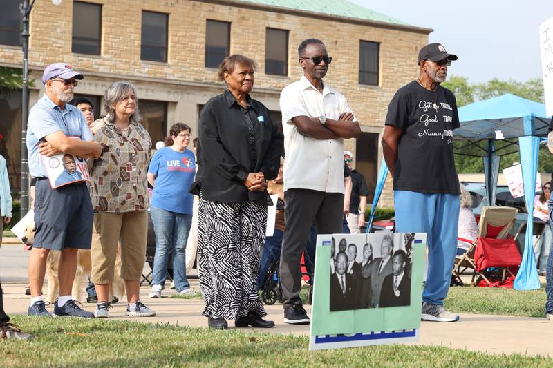 Protesters listen to speakers during a "Good Trouble Lives On" rally held in Kankakee as part of a national day of peaceful protests on Thursday, July 17, 2025.