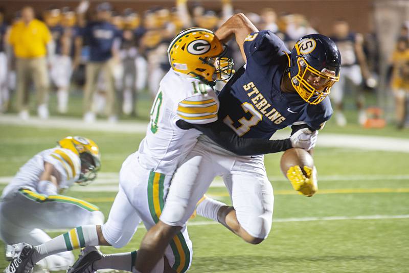 Sterling’s Antonio Tablante fights over the goal line for a TD Friday, Sept. 23, 2022 against Geneseo.