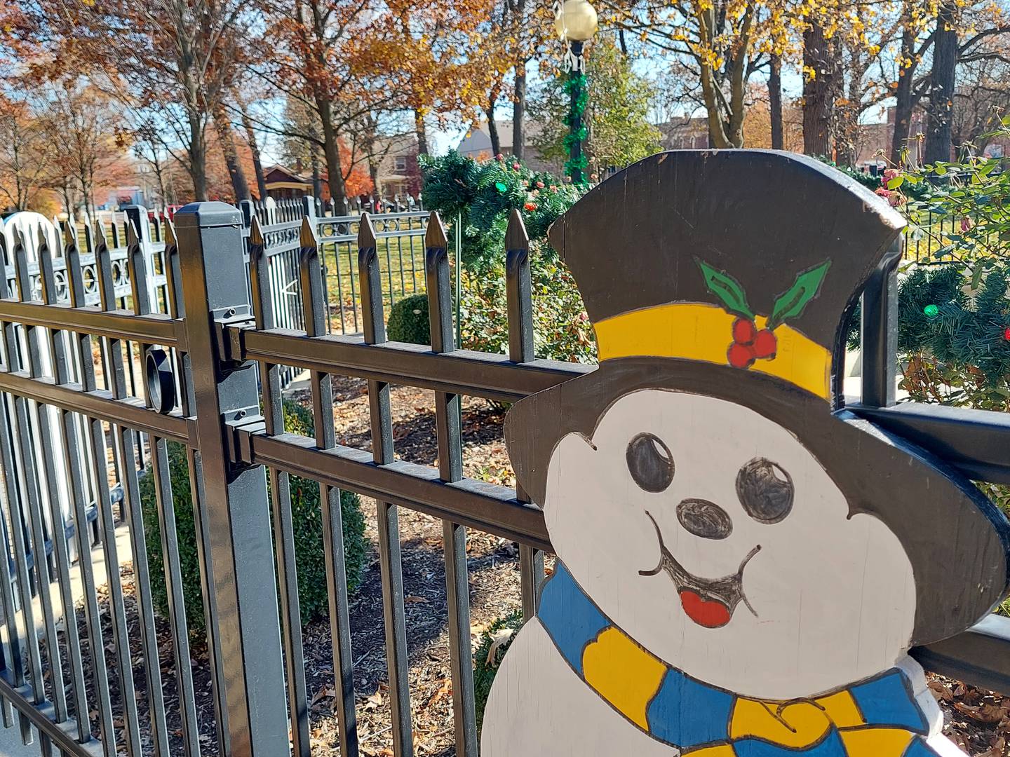 A painted snowman is displayed along the City Park fountain on Saturday, Nov. 11, 2023.