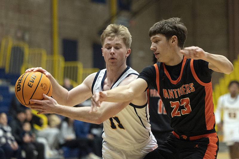 Sterling’s Will Ports works against UT’s Tucker Speckman Tuesday, Jan. 14, 2025.