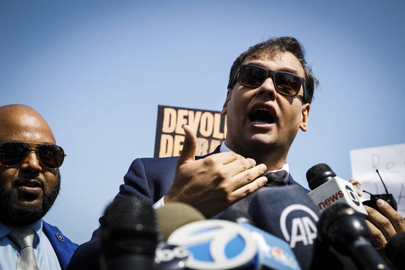 U.S. Rep. George Santos, R-N.Y., speaks to the media outside the federal courthouse in Central Islip, N.Y., Wednesday May 10, 2023. Santos, the New York Republican infamous for fabricating his life story, pleaded not guilty Wednesday to charges he duped donors, stole from his campaign and lied to Congress about being a millionaire, all while cheating to collect unemployment benefits he didn't deserve. Afterward, he said wouldn't drop his reelection bid, defying calls to resign. (AP Photo/Stefan Jeremiah)