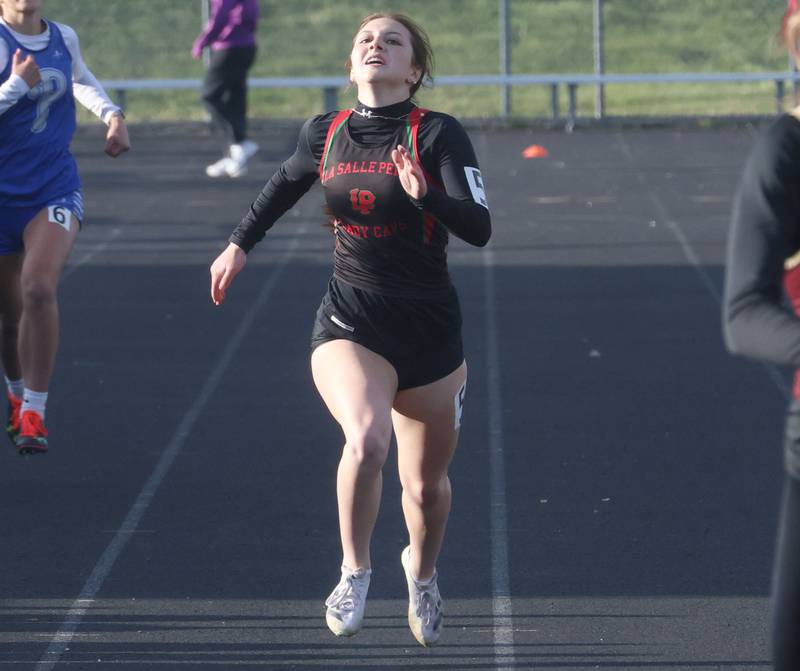 L-P's Kiera Mertes runs the 400 meter run during the Class 2A Sectional track meet on Wednesday, May 13, 2026 in the Jeff Prusator Athletic Complex at Mendota High School.