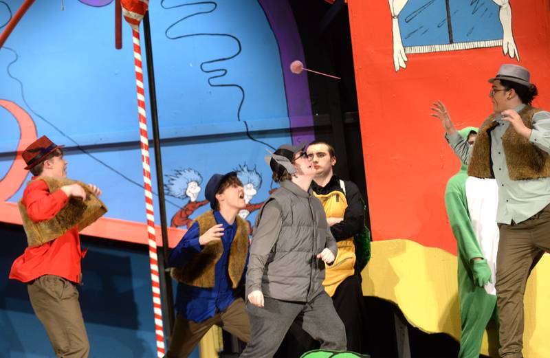 Horton the Elephant (Caleb Ward) tries to catch the clover on which the Who people live as he battles the Wickersham Brothers during the Oregon High School's presentation of "Seussical The Musical" on Friday, March 14, 2025 in the OHS Theater.