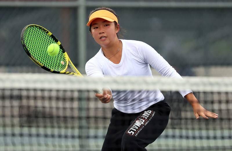 Naperville NorthÕs Gabby Lee play returns a volley in the 2A Doubles 3rd Place Match at the IHSA State Tennis Finals Saturday October 21, 2023 in Buffalo Grove.
