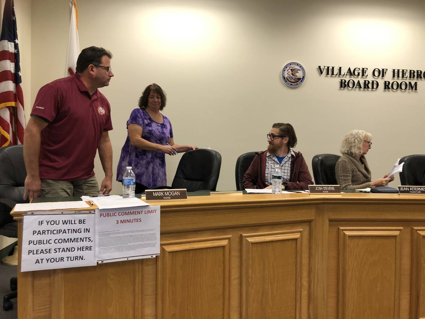 Candace Knaack takes her seat on the Hebron Village Board on Monday, Sept. 26, 2022, sitting between Mark Mogan and Josh Stevens. Both men were also appointed to their positions.