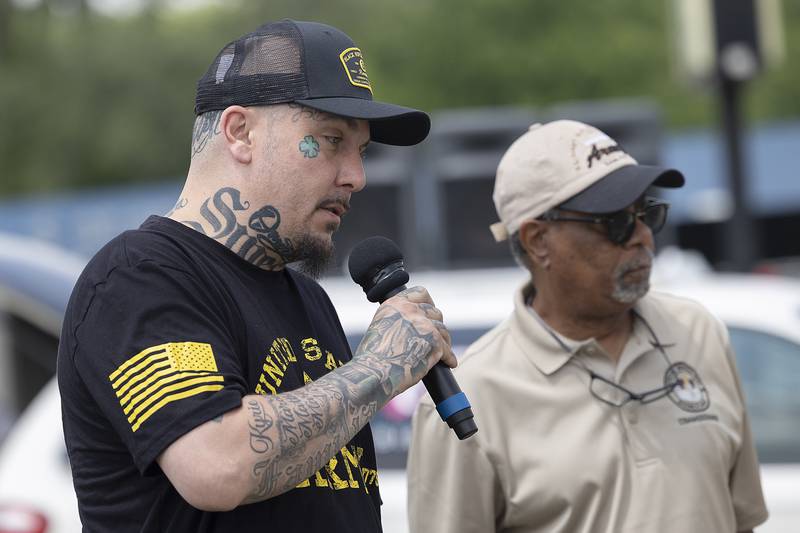 Matthew McMahon of Woodridge joins six other family members with legacy stones at Veterans Park in Dixon during the dedication ceremony Sunday, June 8, 2025.