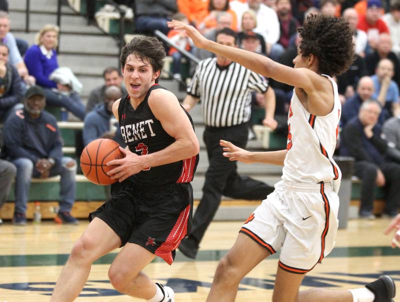 Benet’s Brady Kunka drives toward the basket during a Class 4A Bartlett Sectional semifinal game against Wheaton Warrenville South on Wednesday, March 2, 2022.