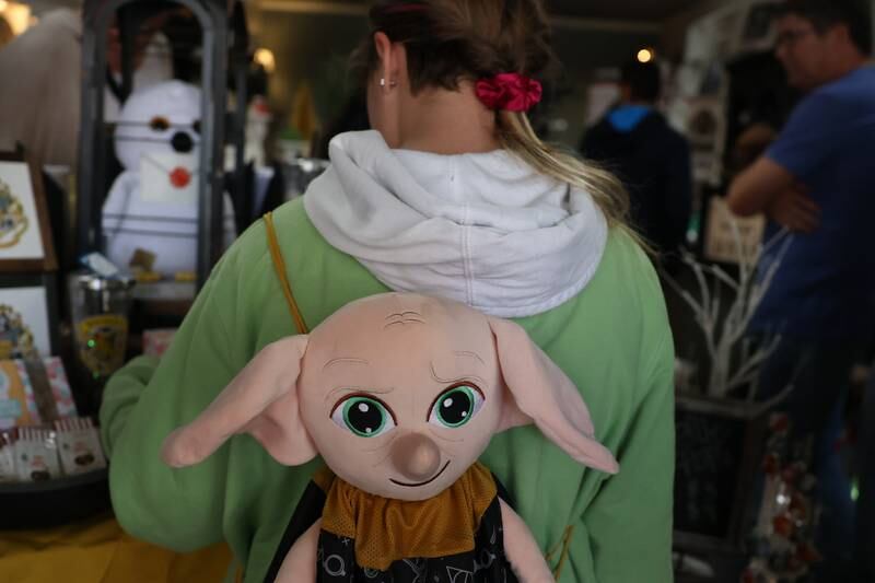 Leia Cioni, 10, of Minooka wears her Dobby backpack, a character from the Harry Potter films, to the Magic in Morris event on Saturday.