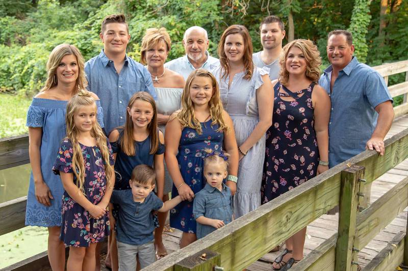 Surrounded by his loving family, Frank Russo (back row, center) is grateful for the $99 calcium artery scoring test at Silver Cross Health Center in Homer Glen that uncovered a serious heart problem and helped save his life!