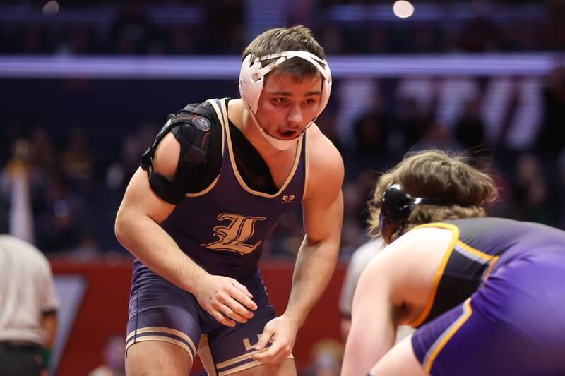 Lemont’s Alex Tagler faces off against Civic’s Abe Wojcikiewicz in the Class 2A 170lb. 3rd place match at State Farm Center in Champaign. Saturday, Feb. 19, 2022, in Champaign.