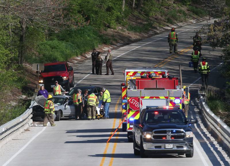 Tonica and Utica fire departments along with La Salle County Sheriff deputies, work the scene of a two-vehicle crash on the Illinois Route 178 bridge over the Vermilion River on Monday, April 22, 2024 near Lowell. The accident happened shortly before 8:30a.m. Both lanes of Illinois 178 were temporarily shut down while emergency crews assisted at the scene.