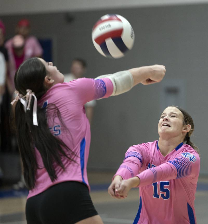Newman’s Isabelle Lanning plays the ball in front of Lucy Oetting against Erie-Prophetstown Tuesday, Oct. 14, 2025.