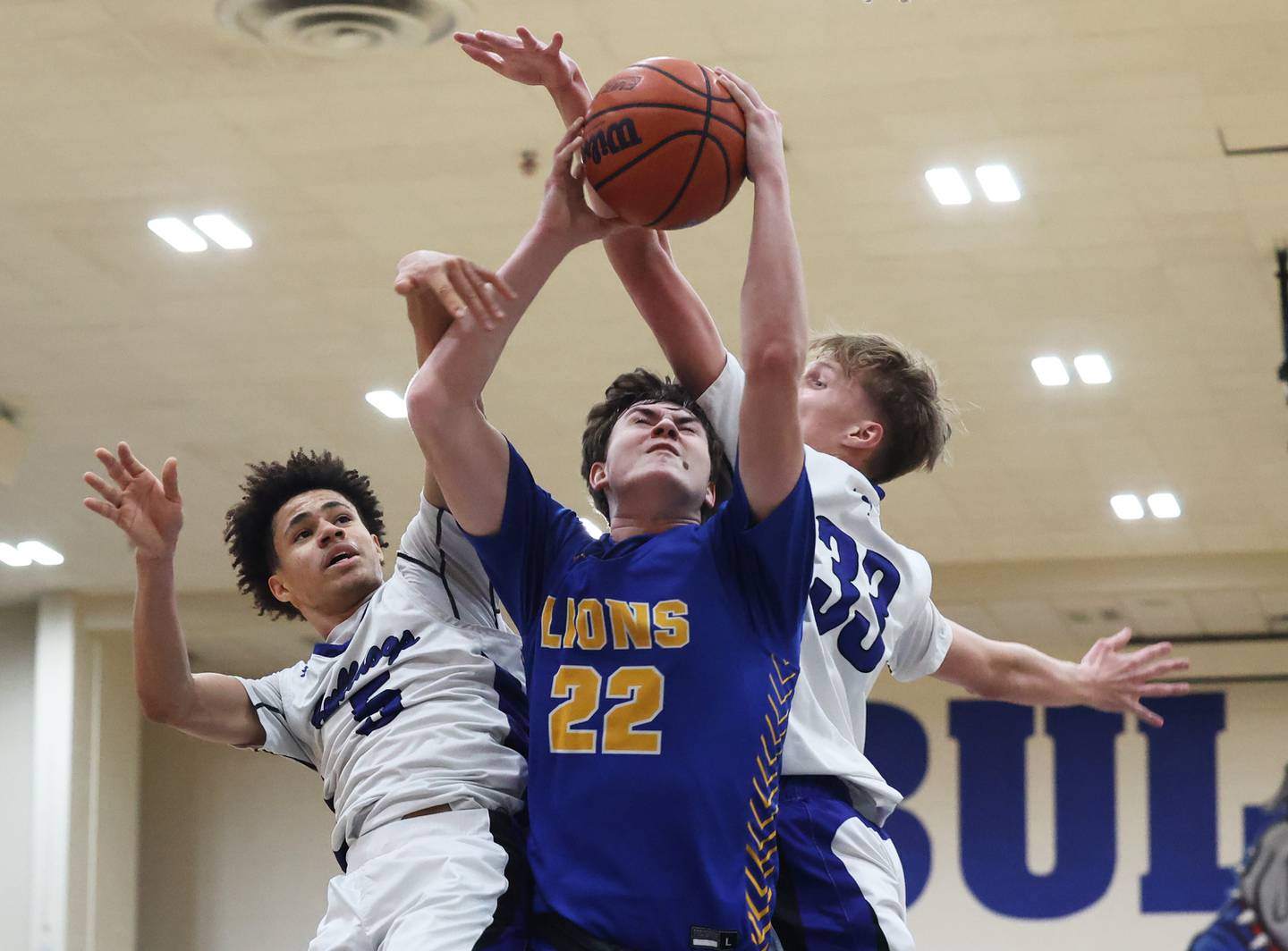 Lyons’ Brady Chambers (22) drives hard to the basket against Riverside Brookfield during a boys varsity basketball game on Friday, Jan. 26, 2024 in Riverside, IL.