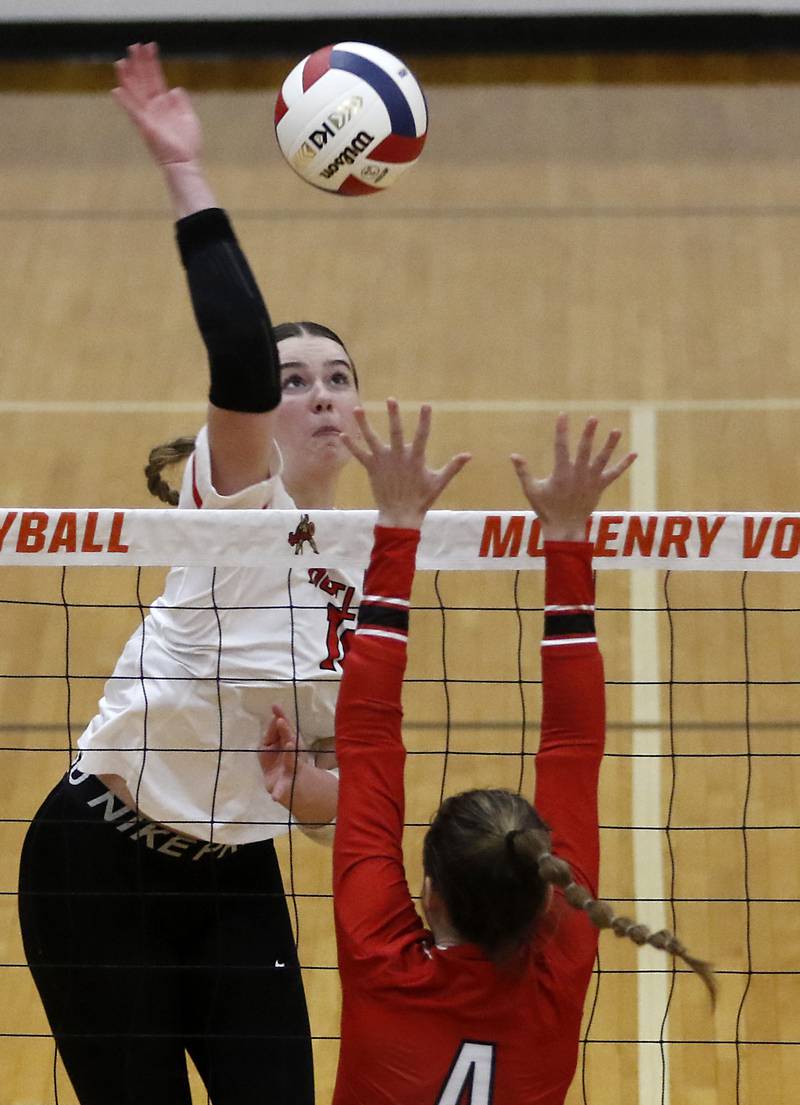 Huntley's Georgia Watson hits there ball over Mundelein's Tylea Crow during an IHSA Class 4A McHenry Sectional volleyball match on Tuesday, Nov. 5, 2024, at McHenry High School Freshman Campus.