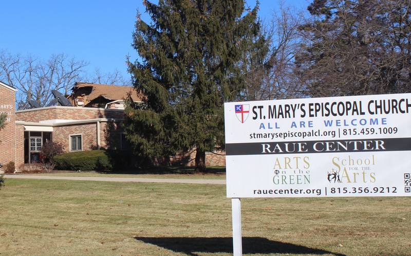 The demolition of the 1850s-era Academy Building can be seen in the background on the grounds of St. Mary's Episcopal Church property in Crystal Lake on Jan. 13, 2026.