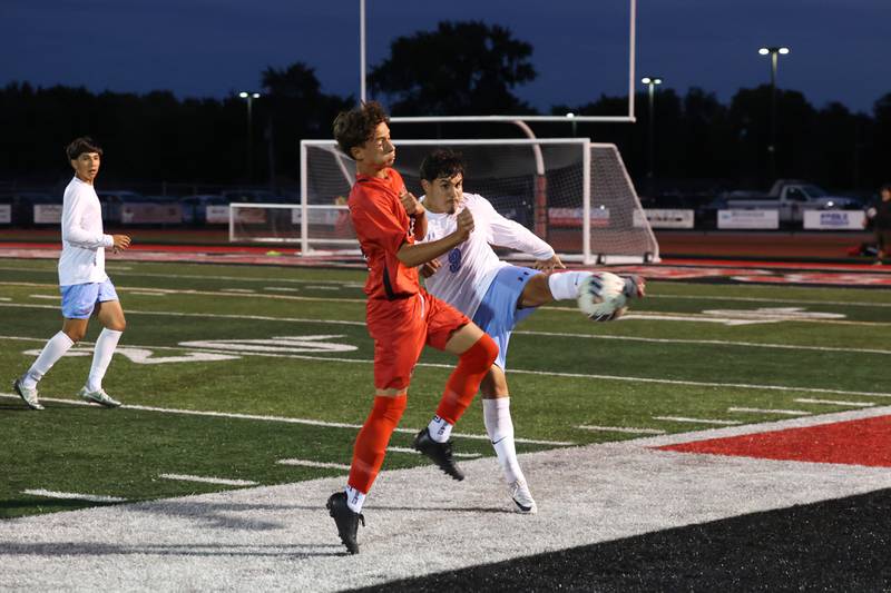Kankakee's Joseph Andrade clears the ball past Bradley-Bourbonnais' Franscisco Adrian during the Boilermakers' 1-0 victory over Kankakee in the All-City matchup on Tuesday, Sept. 9, 2025.