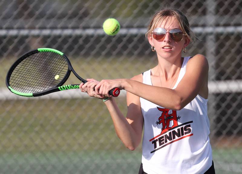 DeKalb’s Alissa Kocjan hits a shot during her doubles match against Sycamore Wednesday, Sept. 18, 2024, at Sycamore High School.