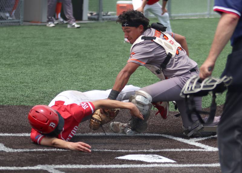 McHenry’s AJ Chavera tags out Barrington’s  Aidan Gryzlo at home in IHSA Class 4A Sectional Title Game baseball action at McHenry High School in McHenry on Saturday, June 7, 2025.