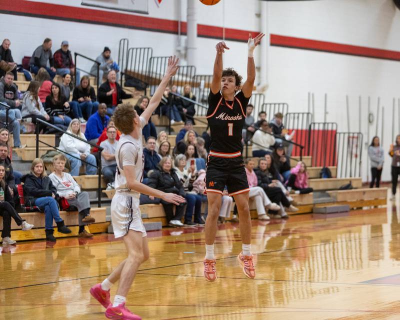Minooka's Nathan Gonzalezshoots a three pointer against Yorkville on Thursday, Jan.22,2026 in Yorkville.
