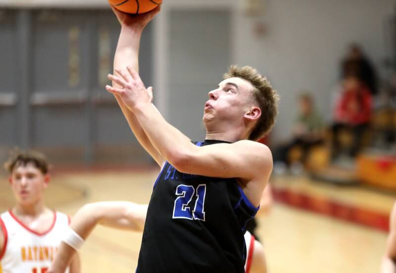 St. Charles North’s Camden Vine gets the ball to the basket during a game against Batavia on Wednesday, Dec. 11, 2024 in Batavia.