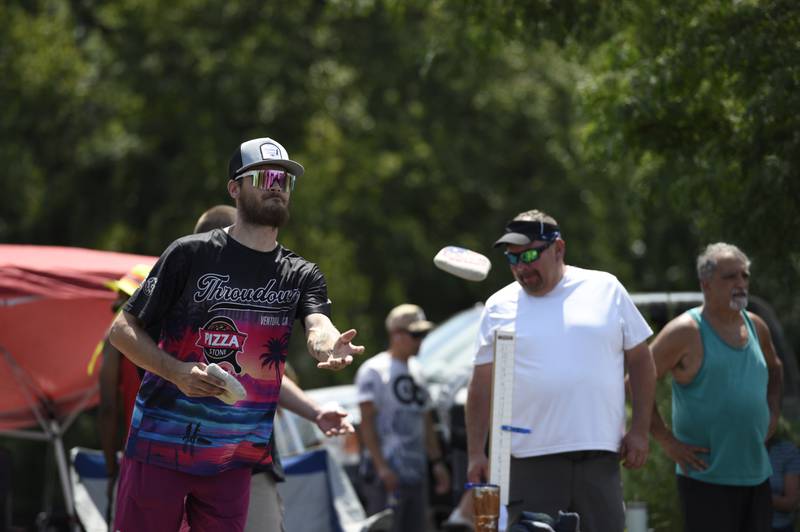 Josh Hess, of Momence, competes in the cornhole tournament in Momence on Sunday, Aug. 10, 2025.  The tournament was the largest of it's kind for the area with 162 participants.