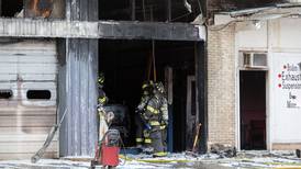 Sterling business damaged when vehicle fire spreads to structure