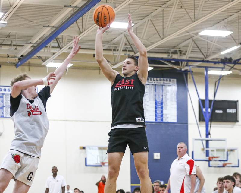 Glenbard East's Michael Nee (4) shoots a jumper off of a step back in their Riverside-Brookfield Shootout basketball game.  June 20, 2025 in Riverside.