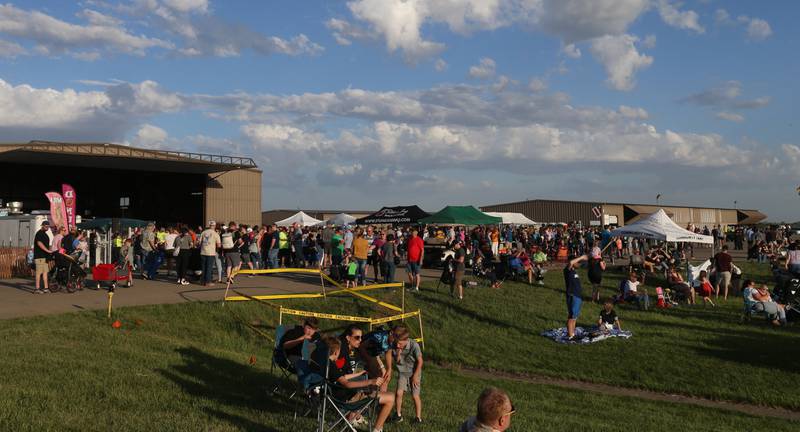 A large crowd gathers during the 10th annual TBM Avenger Reunion and Airshow on Friday, May 16, 2025 at the Illinois Valley Regional Airport in Peru.