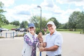 Couples are pair for the golf course at Lake Carroll
