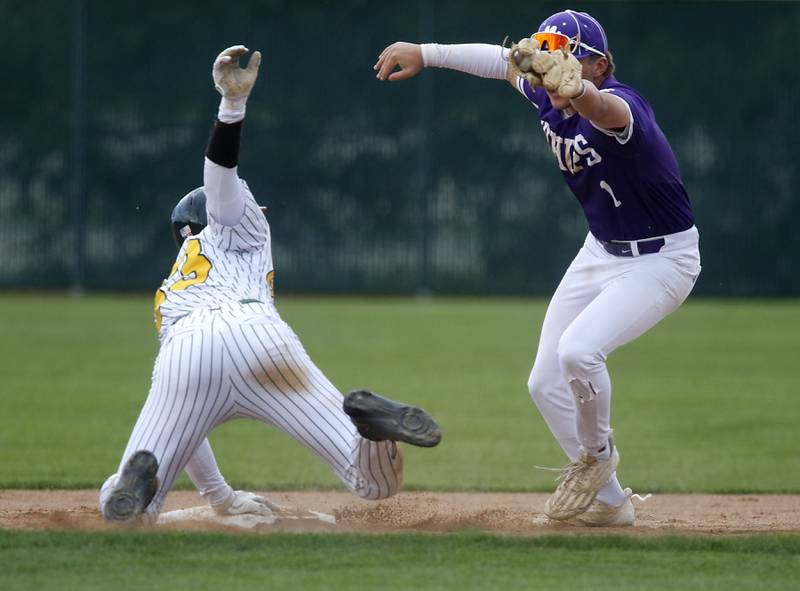 Hampshire's Shane Pfeiffer tries to tag Crystal Lake South's Carson Trivellini as she steals second base during a Fox Valley Conference baseball game on Monday, April 29, 2026, at Crystal Lake South High School.