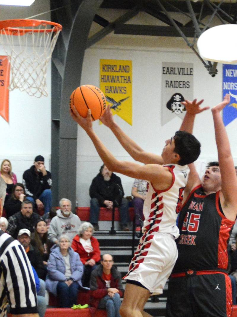 LaMoille sophomore Braden Fischer takes in a layup in Tuesday's Senior Night game against Indian Creek.