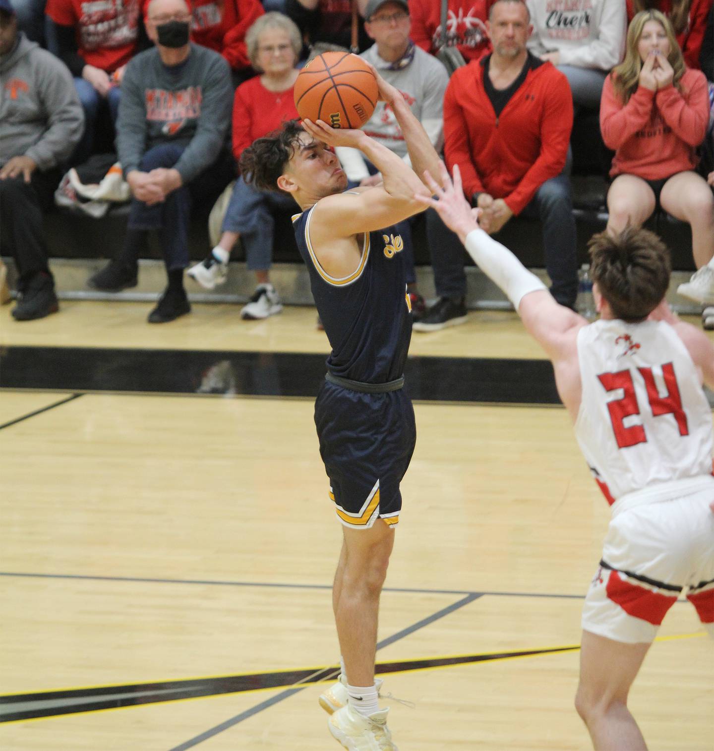 Sterling's JP Schilling shoots over Metamora's Drew Tucker (24) in the Class 3A Galesburg Sectional semifinals on Wednesday, March 1, 2023.
