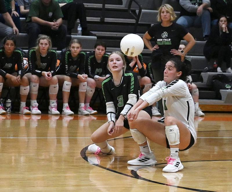 Rock Falls’ Zoe Henson and Carli Kobbeman receive a serve during the 2A sectional game against Genoa Kingston, Wednesday, Nov. 2, 2022.