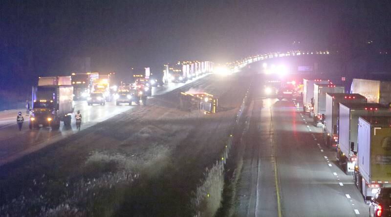 A truck lays on it's side in the median on Thursday, Jan. 9, 2024 near the Spring Valley exit on Interstate 80 near Ladd. A cattle hauler tipped over allowing cows to roam on Interstate 80.