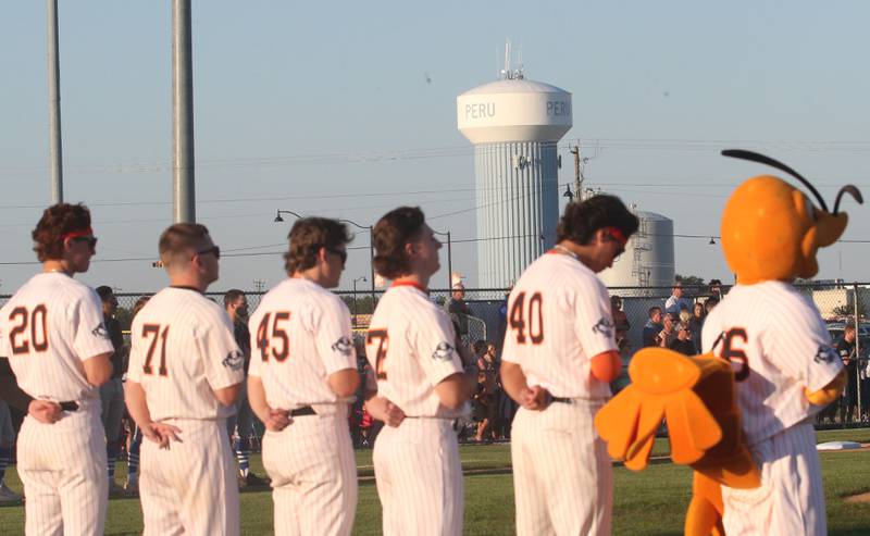 Pistol Shrimp players stand during the National Anthem of the Prospect League Championship Series against Rex on Wednesday, Aug. 7, 2024 at Schweickert Stadium in Peru.