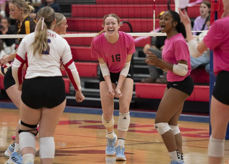 Dundee-Crown's Victoria Brents, center, celebrates a point with teammates during their game against Jacobs on Thursday, October 16, 2025 at Dundee-Crown High School in Carpentersville. Ryan Rayburn for Shaw Local