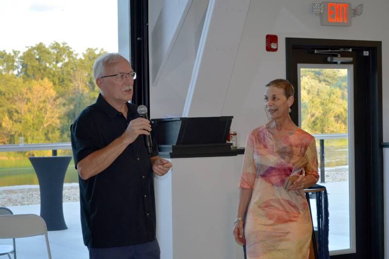 Oregon Area Chamber of Commerce 2023 Citizens of the Year James Brown, left, and Karen Virnoche talk after accepting their award during the Chamber's annual dinner at River's Edge Experience in Oregon on Thursday, Aug. 17, 2023.