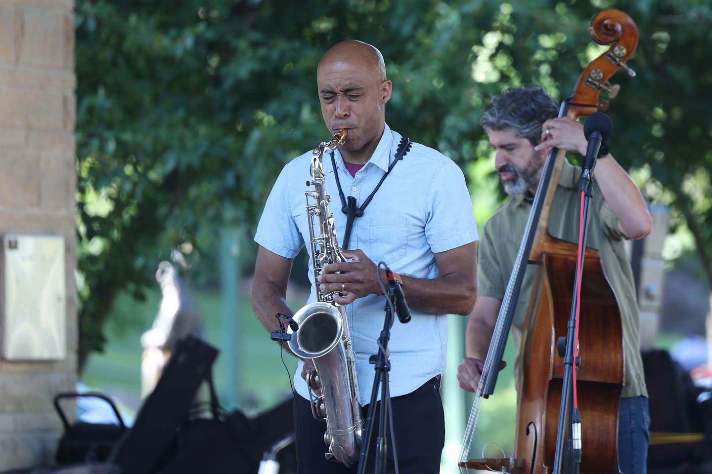 Chris Greene plays the saxophone at the Wine, Jazz and Arts Fest at Bicentennial Park in Joliet on Saturday, Aug. 19, 2023.