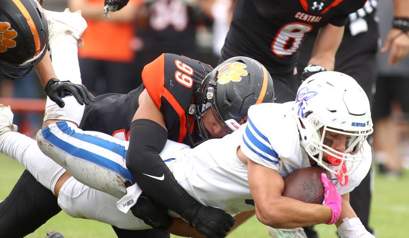 Crystal Lake Central’s Anthony Morales brings down Burlington Central’s Lucas Kerr in varsity football at Crystal Lake Saturday.