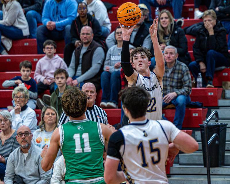 Marquette's Griffin Dobberstein (22) shoots three pointer in game against Dwight on Saturday, Feb. 21, 2026 at Marseilles Elementary School.