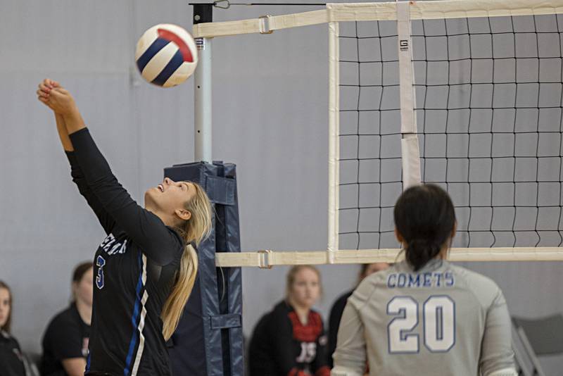 Newman’s Ellie Rude plays the ball against Forreston Saturday, Sept. 30, 2023 during the Sterling Volleyball Invitational held at Challand Middle School.
