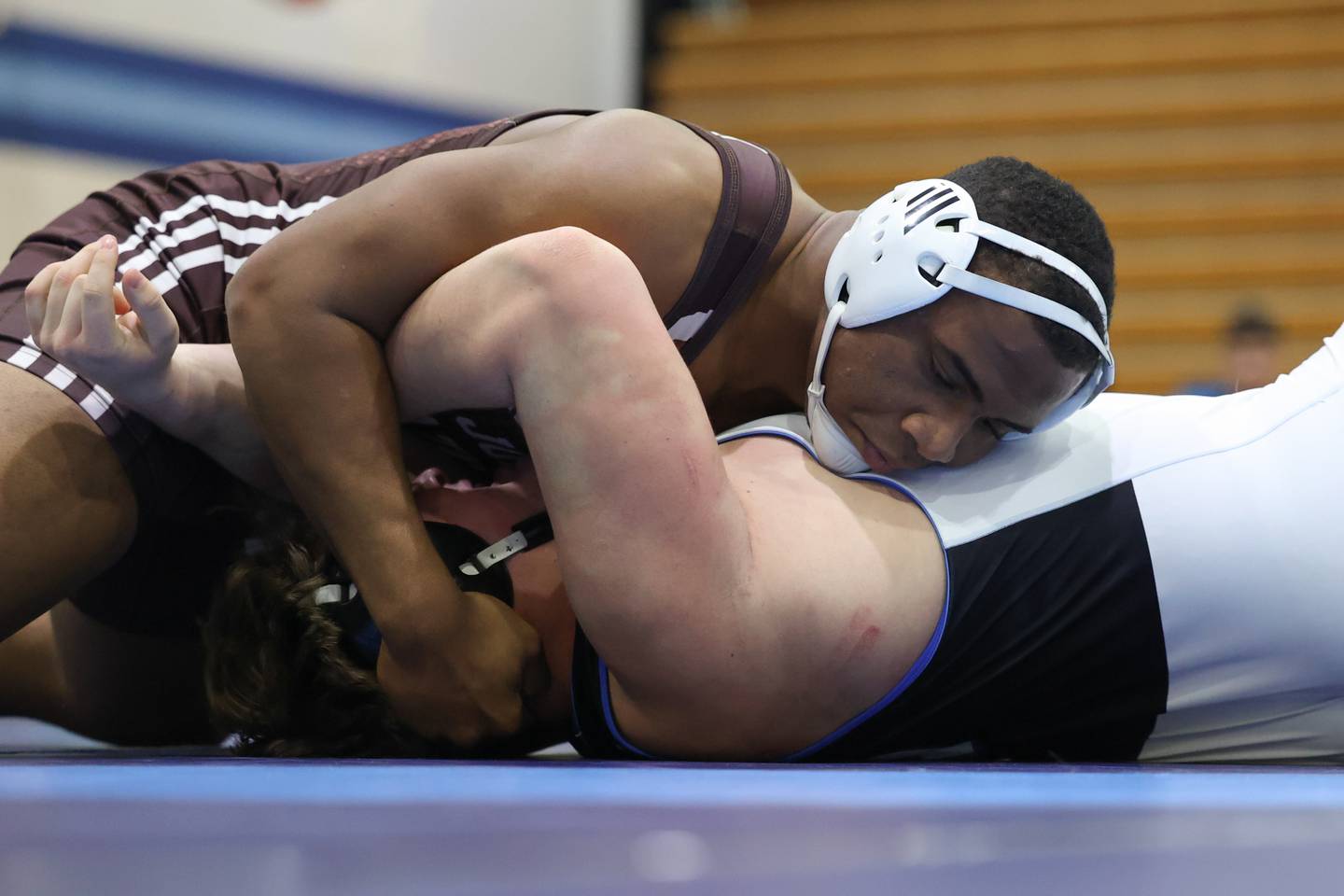 Joliet Catholic’s Dillan Johnson looks to pin Lincoln-Way East’s Gage LaDere in the Class 3A dual team sectional at Downers Grove South High School on Tuesday, Feb. 20th 2024.
