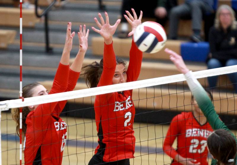 Benet’s Sophia Chinetti (left) and Gabby Stasys go up for a block during the Class 4A St. Charles North Supersectional on Monday, Nov. 11, 2024 against New Trier.